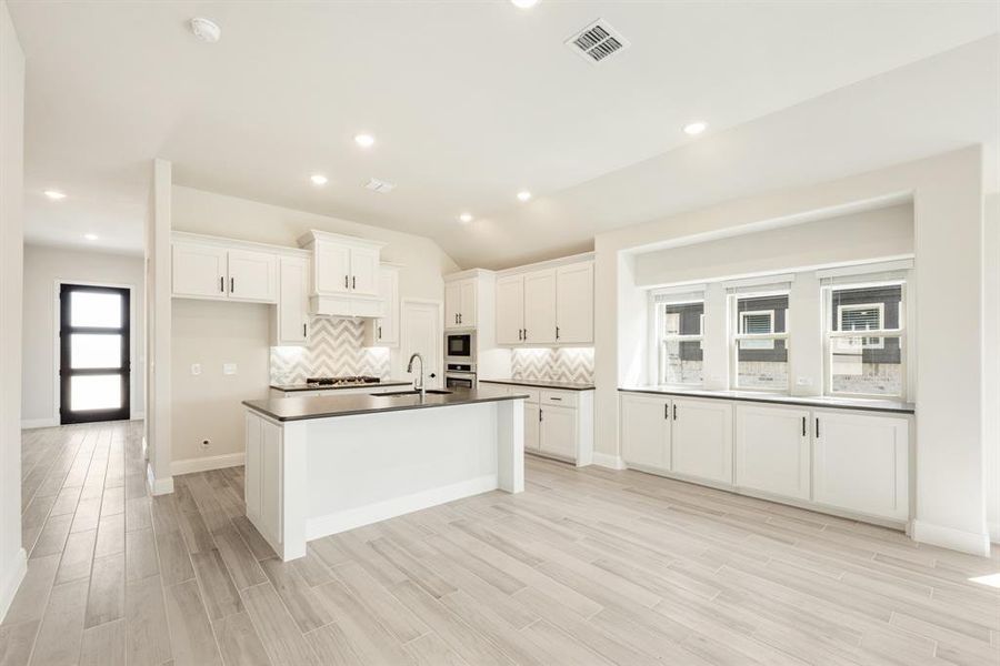 Furnished interior view inside a new home in Devonshire Classic 50-55, Forney (Image 13). Furnished interior view inside a new home in Devonshire Classic 50-55, Forney (Image 13).