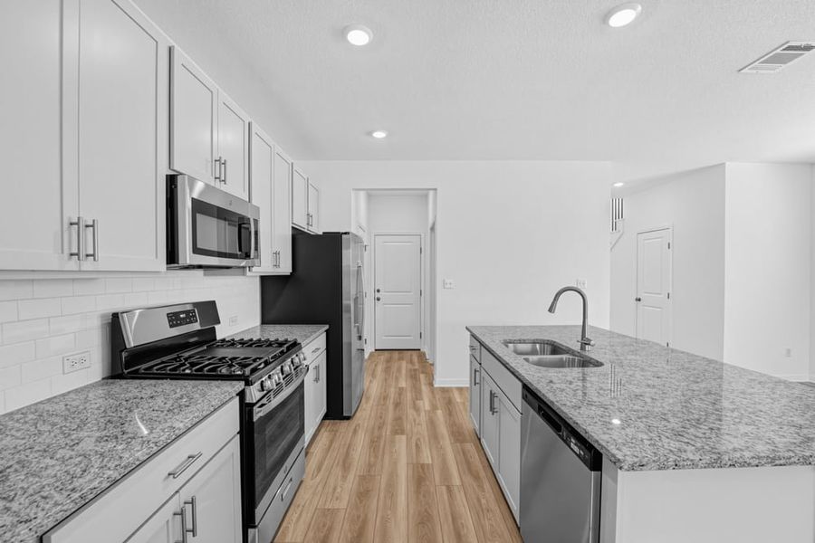 Furnished interior view inside a new home in Sunfield, Buda (Image 7).
