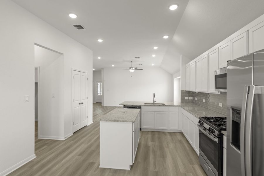 Furnished interior view inside a new home in Village at Three Oaks, Seguin (Image 9).