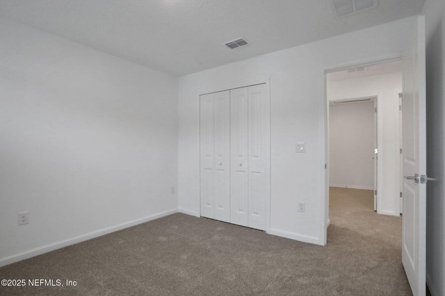 Spacious, unfurnished interior of a new home in TrailMark, St. Augustine (Image 29).