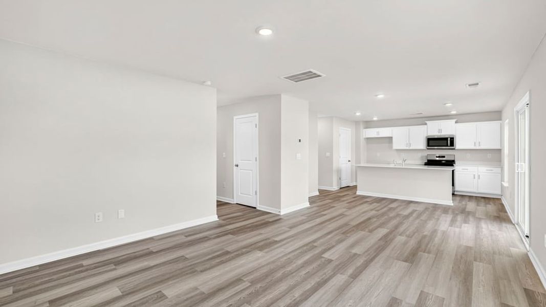 Spacious, unfurnished interior of a new home in Bentley Park, Greenwood (Image 21).