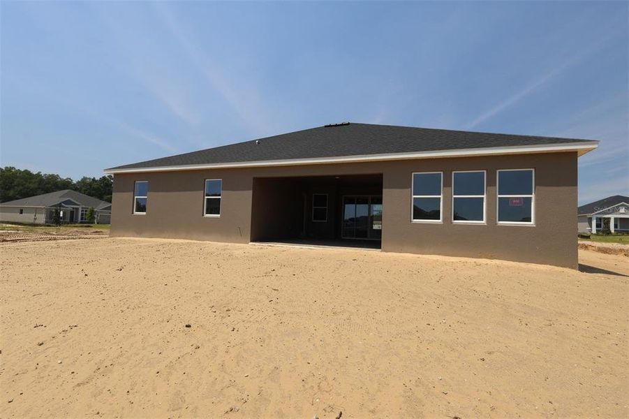 Exterior details and patio area of a home in Wolf Lake Ranch, Apopka (Image 3).