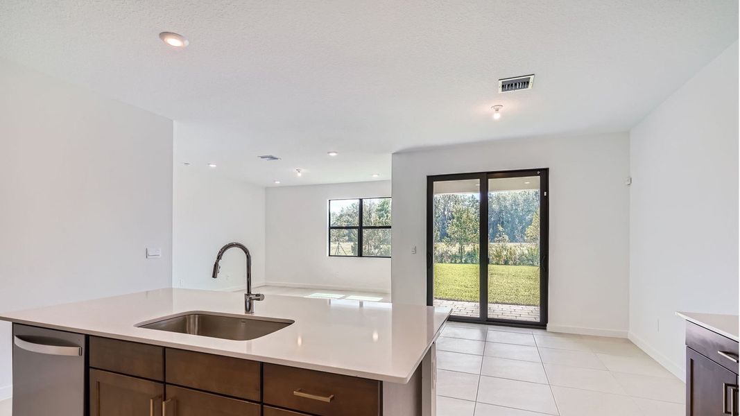 Representative furnished interior of a home built from the Cali by D.R. Horton in Twin Oaks, Stuart (Image 7).