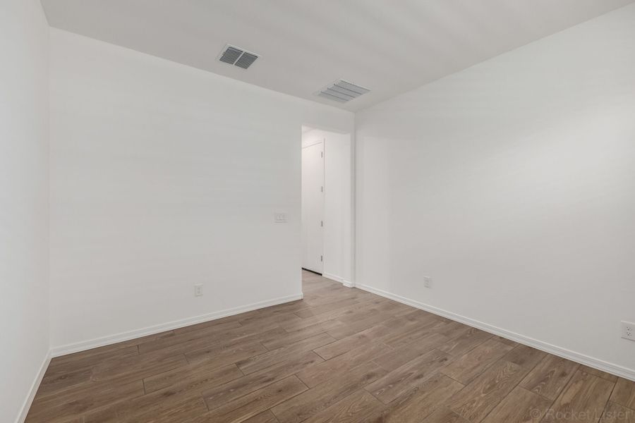 Spacious, unfurnished interior of a new home in Empire Pointe, Queen Creek (Image 10).