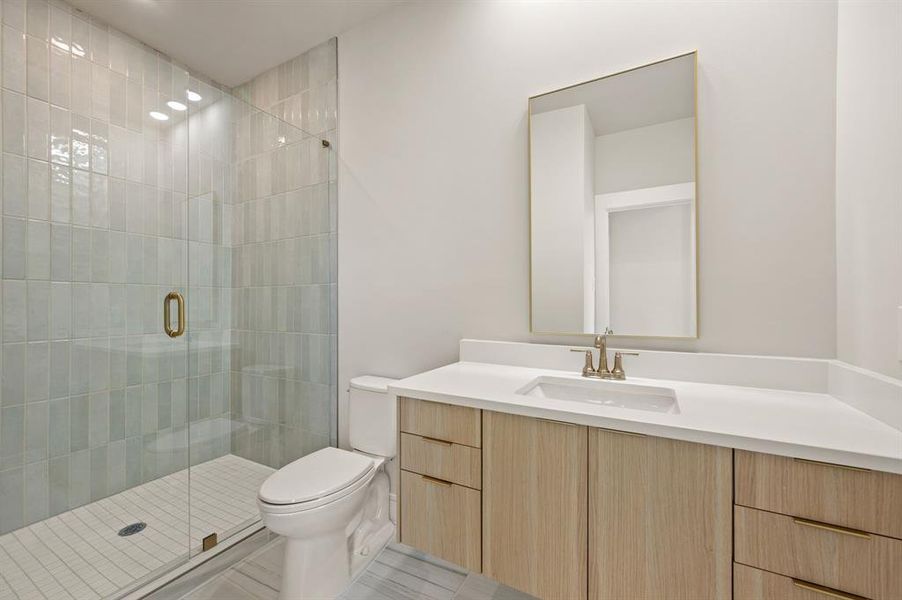 Friends and family will feel right at home in either of the beautifully finished guest baths.