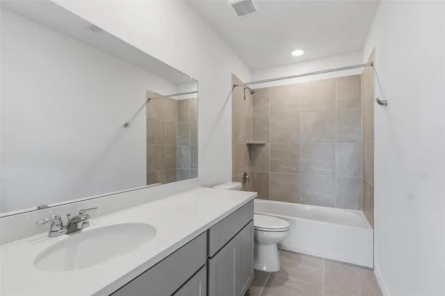 Furnished interior view inside a new home in Oakwood Estates, Waller (Image 6).