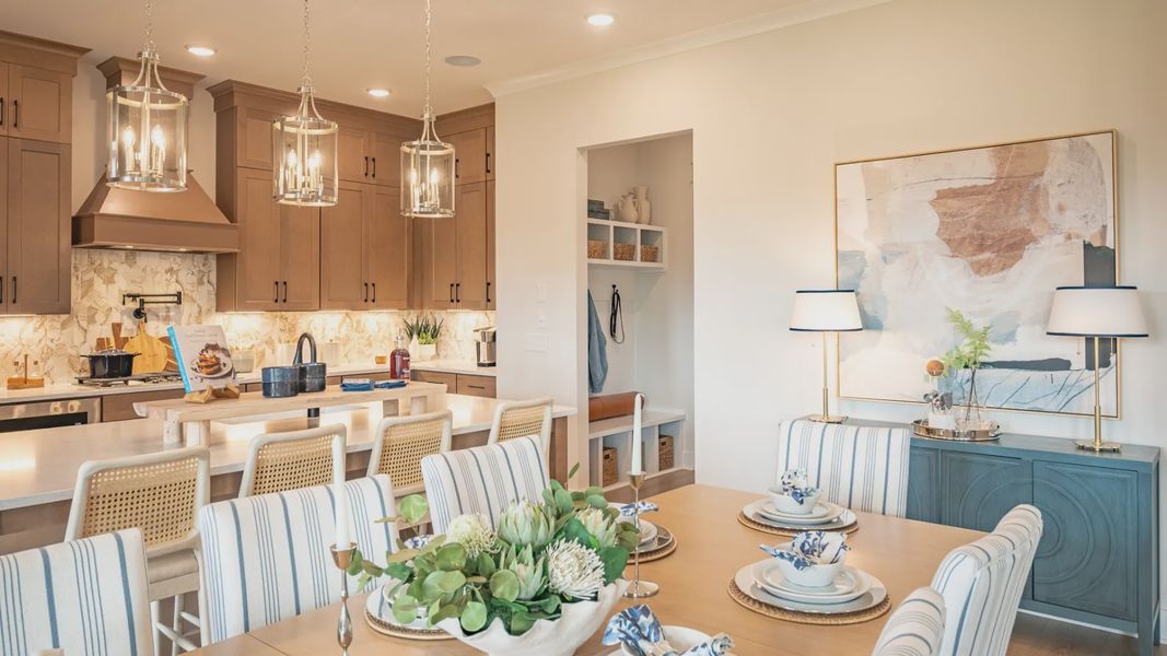 Kitchen and Dining area layout with drop-zone mud room coming from the garage entrance