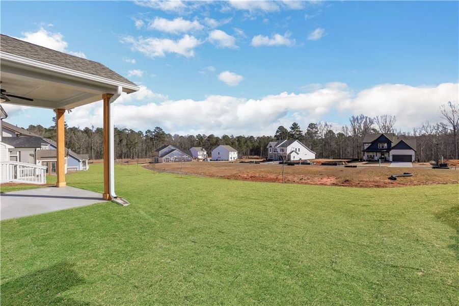 Exterior details and patio area of a home in Twin Lakes, Hoschton (Image 28).