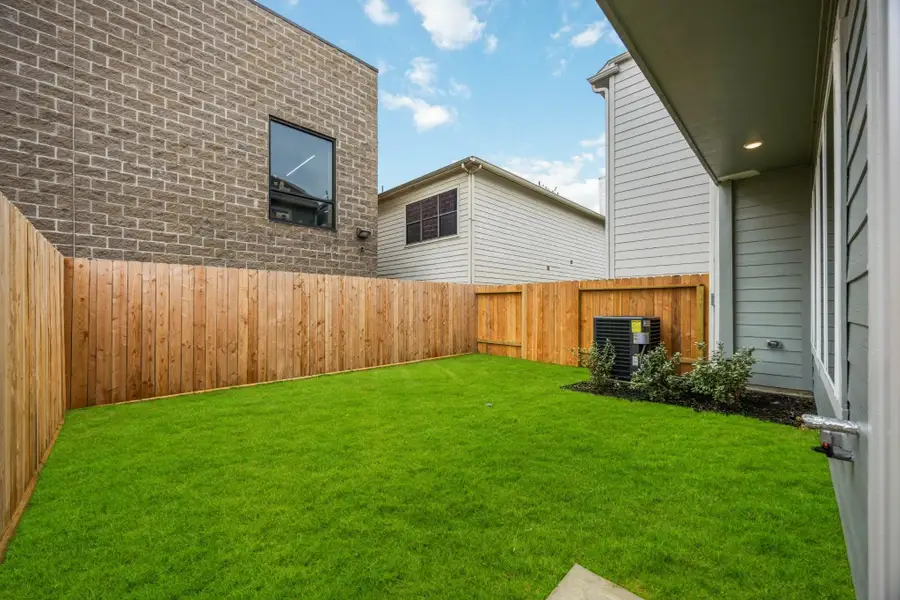 Grilling Greatness: Ready for your culinary exploits outdoors with a convenient natural gas connection in your private, fenced back yard.