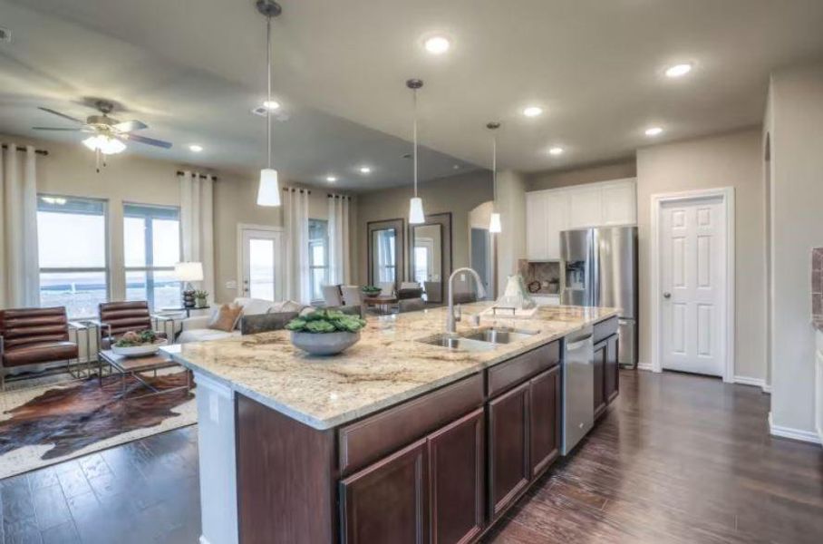 Photo of Pulte model home with same floor plan, not of actual home listed.