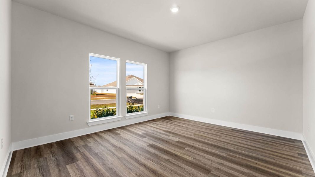 Representative unfurnished interior of a home built from the The Mckenzie by D.R. Horton in Liberty, Panama City (Image 17).