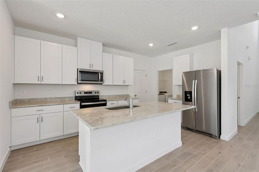 Furnished interior view inside a new home in Flagler Village - Classic Series, Palm Coast (Image 8).