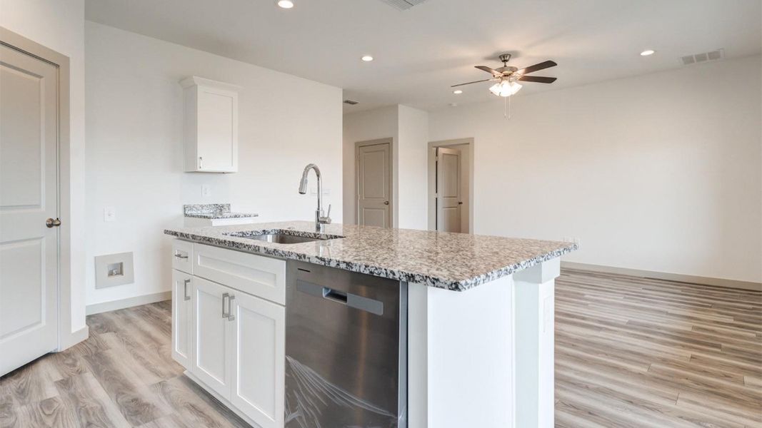 Representative furnished interior of a home built from the The Ashburn by D.R. Horton in Allen Farms, Lubbock (Image 8).