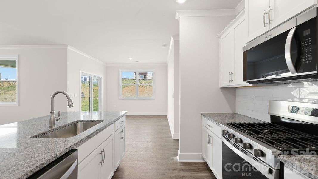 Furnished interior view inside a new home in Tap Root Farms, Hendersonville (Image 4).