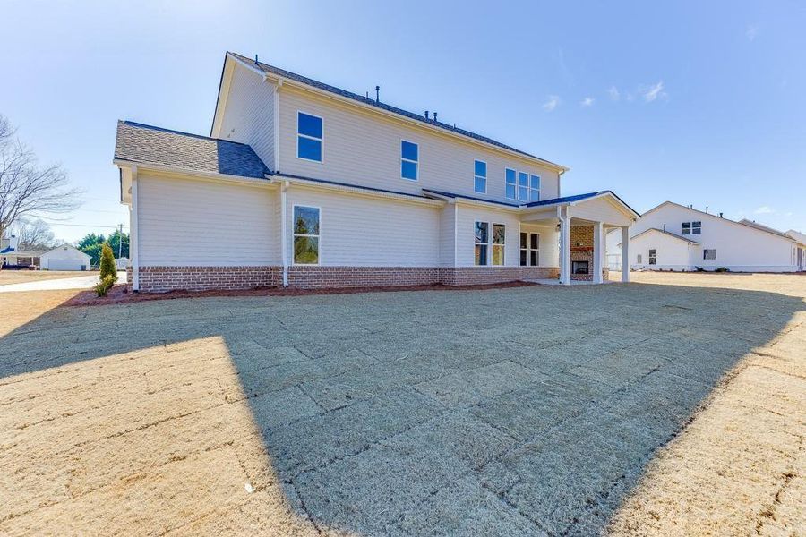 Front exterior of a new home in , Gainesville, GA, highlighting curb appeal (Image 22).