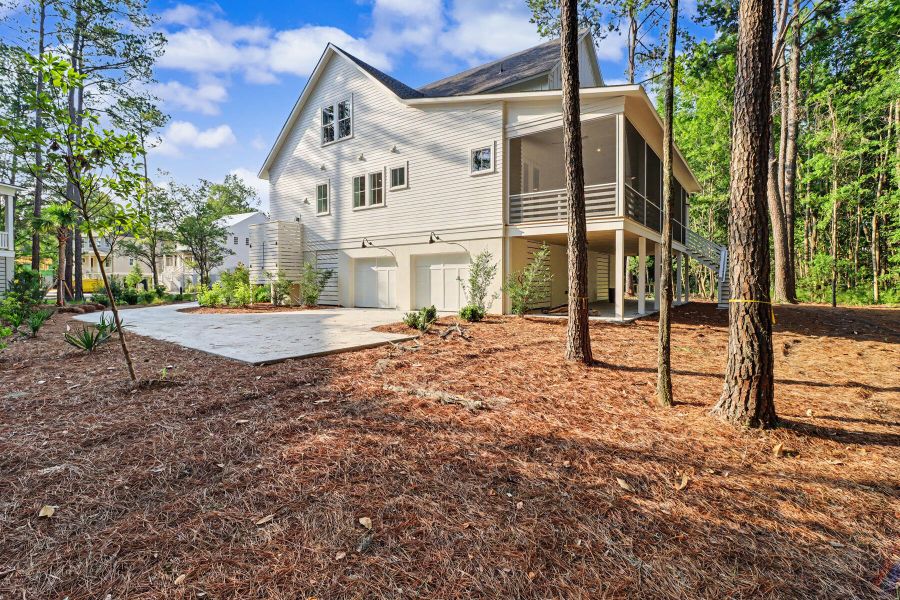 Exterior details and patio area of a home in The Preserve at Pennys Creek, Johns Island (Image 29).