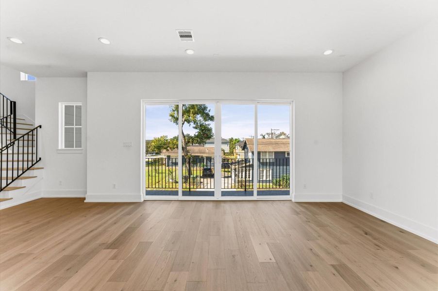 16' sliding glass door leading out to the balcony off of the living area.