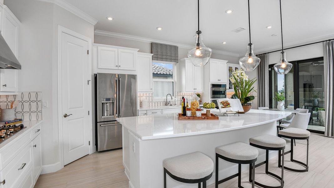 Representative furnished interior of a home built from the Lazio by Taylor Morrison in Astor Creek Golf and Country Club, Port St. Lucie (Image 8).