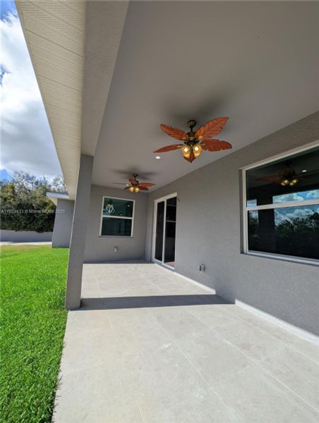Front exterior of a new home in , Lehigh Acres, FL, highlighting curb appeal (Image 2).