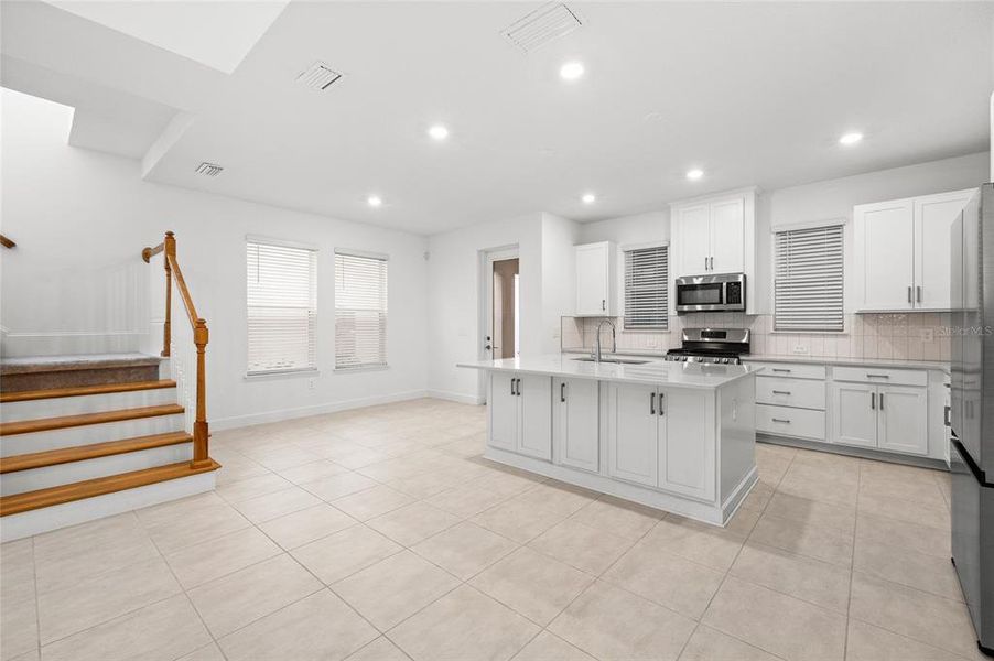 Furnished interior view inside a new home in Harvest At Ovation 50s, Winter Garden (Image 4).