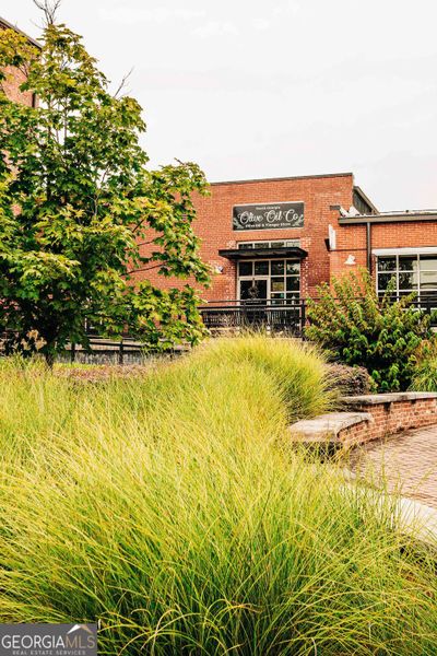 Front exterior of a new home in Rosewood Lake Estates, Hoschton, GA, highlighting curb appeal (Image 49).