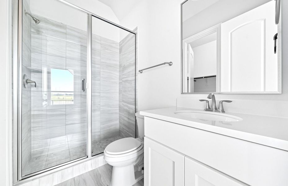 Furnished interior view inside a new home in Bridgeland 60′, Cypress (Image 9).