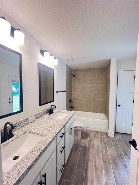 Furnished interior view inside a new home in Hill Country Estates, Dade City (Image 8).