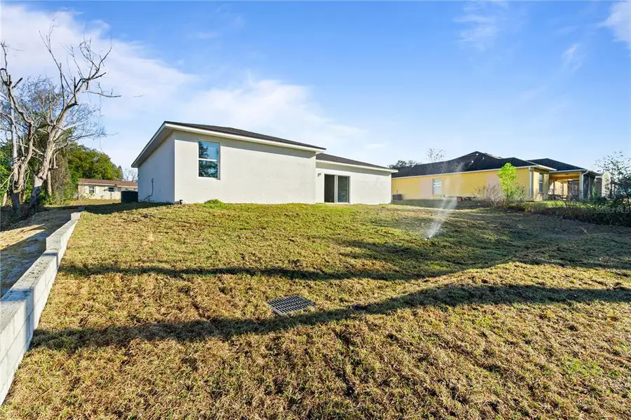 Exterior details and patio area of a home in , Deltona (Image 22).