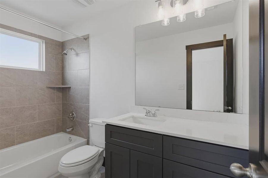 Representative furnished interior of a home built from the Bennington 2434 S 3CG by Saratoga Homes in Turnbo Ranch, Killeen (Image 7).