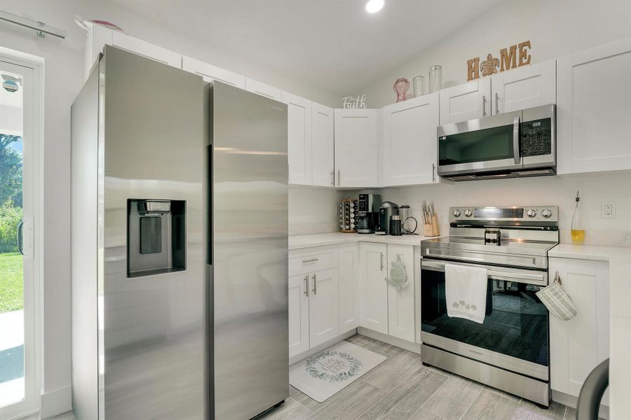 Furnished interior view inside a new home in , Okeechobee (Image 5).