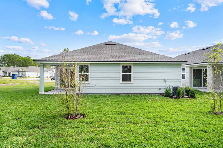 Lot 27 Rear Exterior with Covered Patio at Reserve East in Flagler Beach Lot 27 Rear Exterior with Covered Patio at Reserve East in Flagler Beach