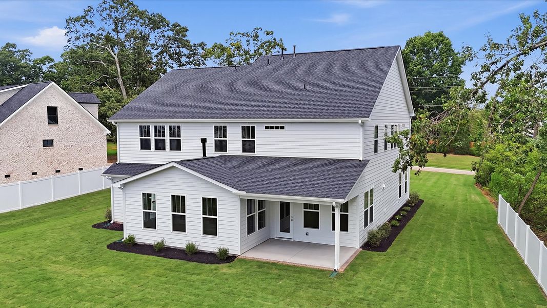 Exterior details and patio area of a home in Pelham Crossing Single Family Homes, Greer (Image 4).