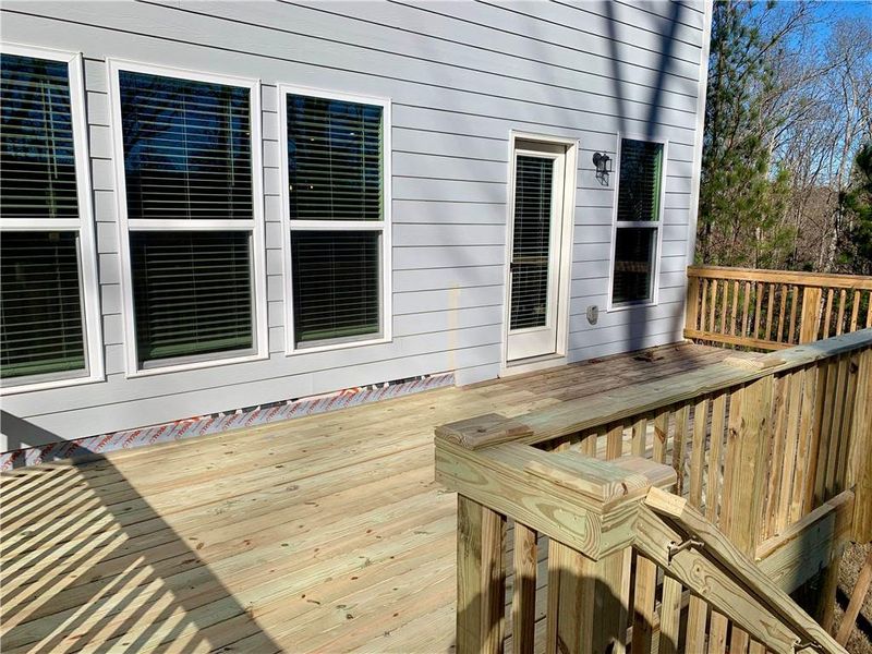 Exterior details and patio area of a home in Reunion, Hoschton (Image 23).