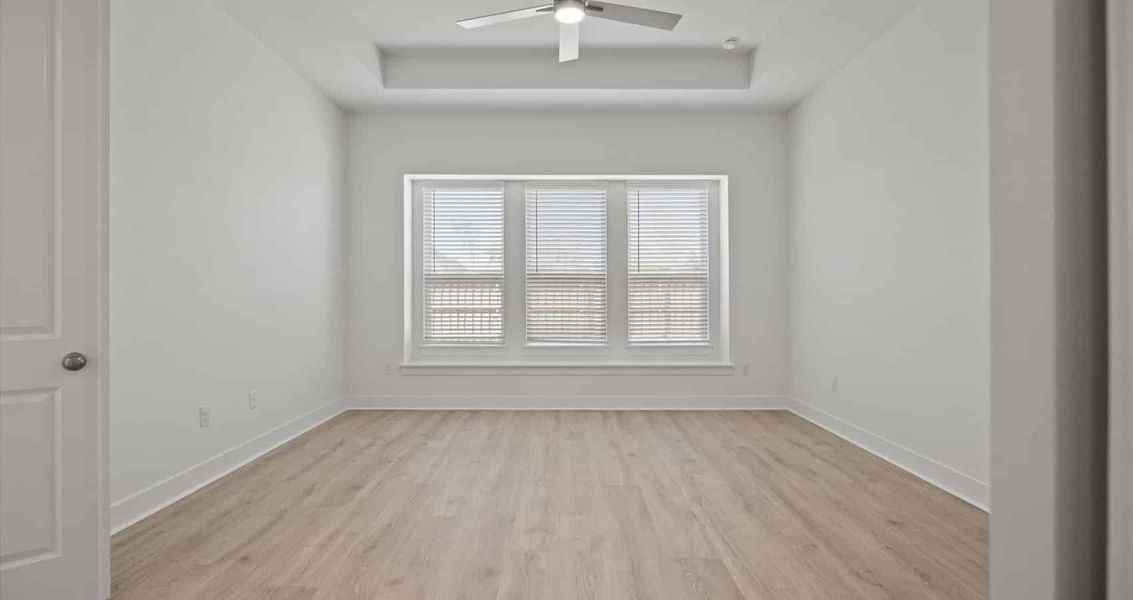 Representative unfurnished interior of a home built from the Samantha by Chesmar Homes in Sunfield, Buda (Image 9).