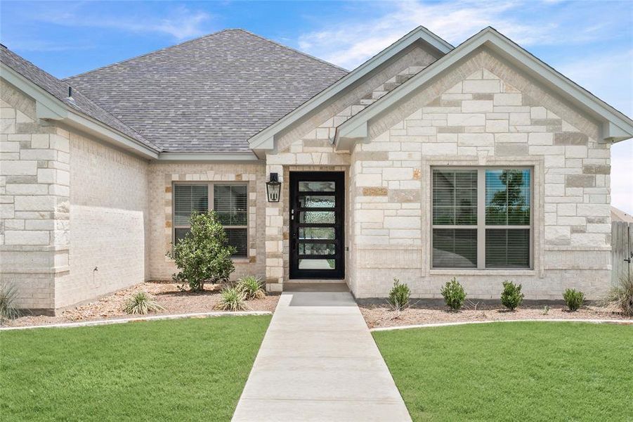 Front exterior of a new home in , Troy, TX, highlighting curb appeal (Image 23).