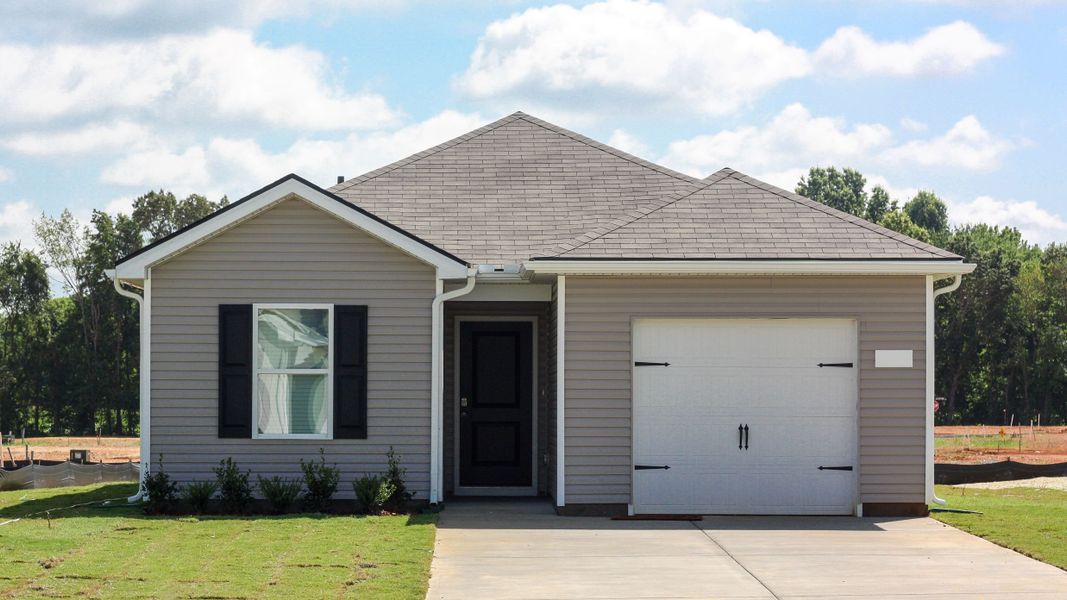 Front exterior of a new home in Parkside Point, Portland, TN, highlighting curb appeal (Image 1). Front exterior of a new home in Parkside Point, Portland, TN, highlighting curb appeal (Image 1).