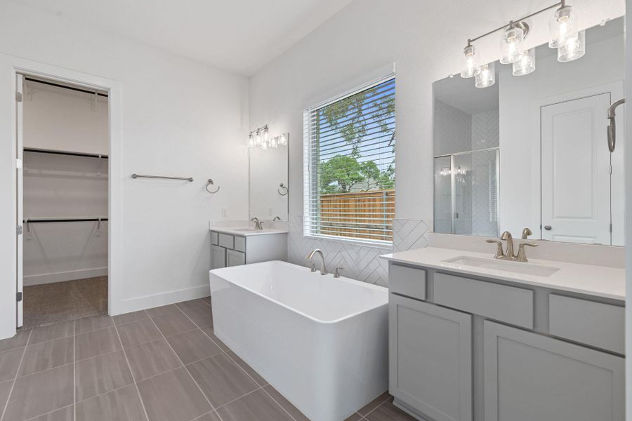 Primary Bath retreat with dual vanities & soaking tub Primary Bath retreat with dual vanities & soaking tub
