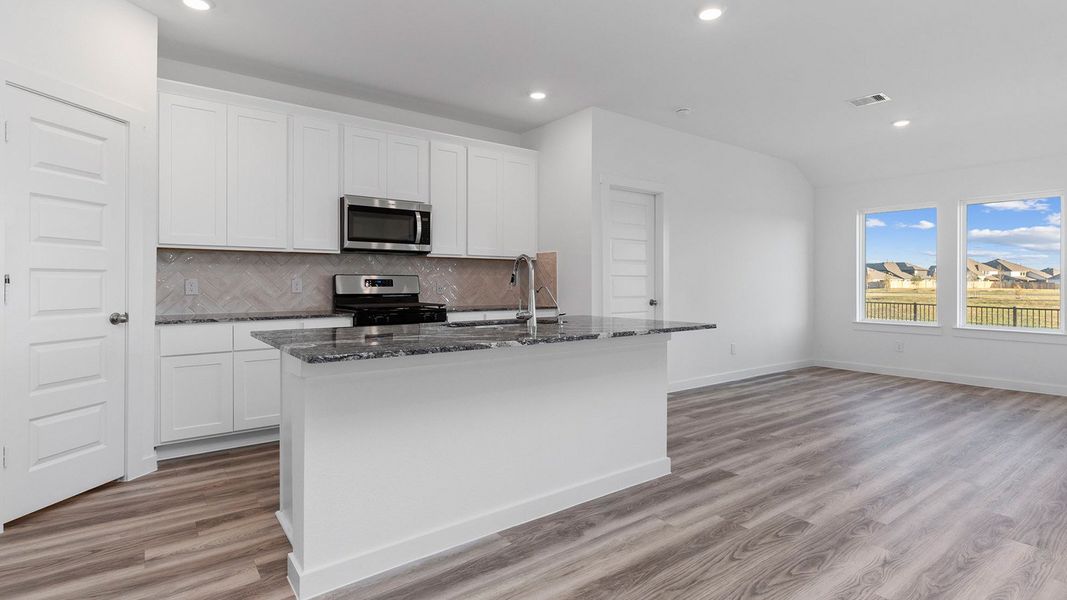 Representative furnished interior of a home built from the Huntsville by D.R. Horton in Marlow Lake, Texas City (Image 4).