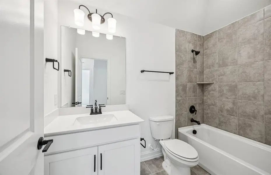 Upgraded secondary bath with elegant finishes Upgraded secondary bath with elegant finishes