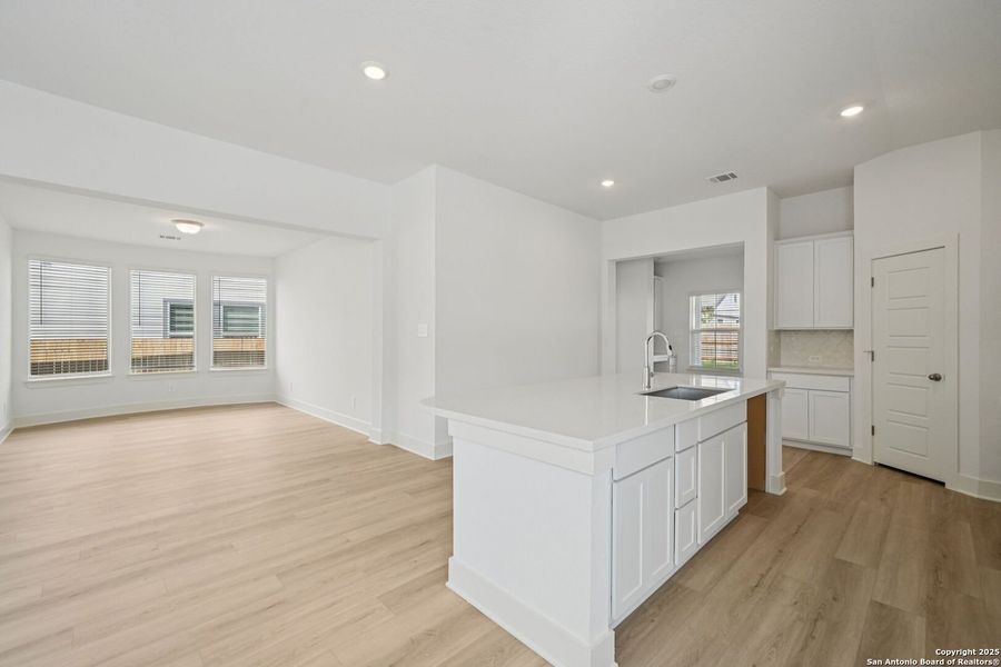 Furnished interior view inside a new home in Estancia Ranch - Premier Series, San Antonio (Image 10).