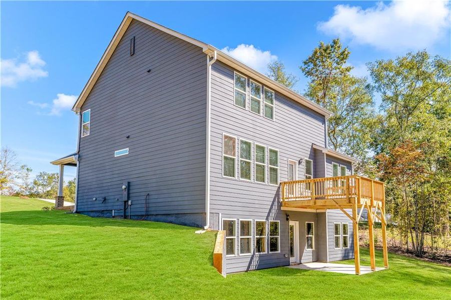 Exterior details and patio area of a home in Waters Edge, Mansfield (Image 16).