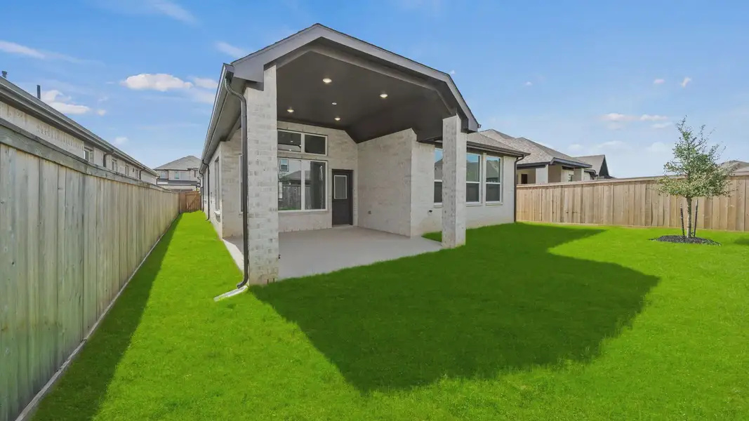 Exterior details and patio area of a home in Attwater 55s, Waller (Image 4).
