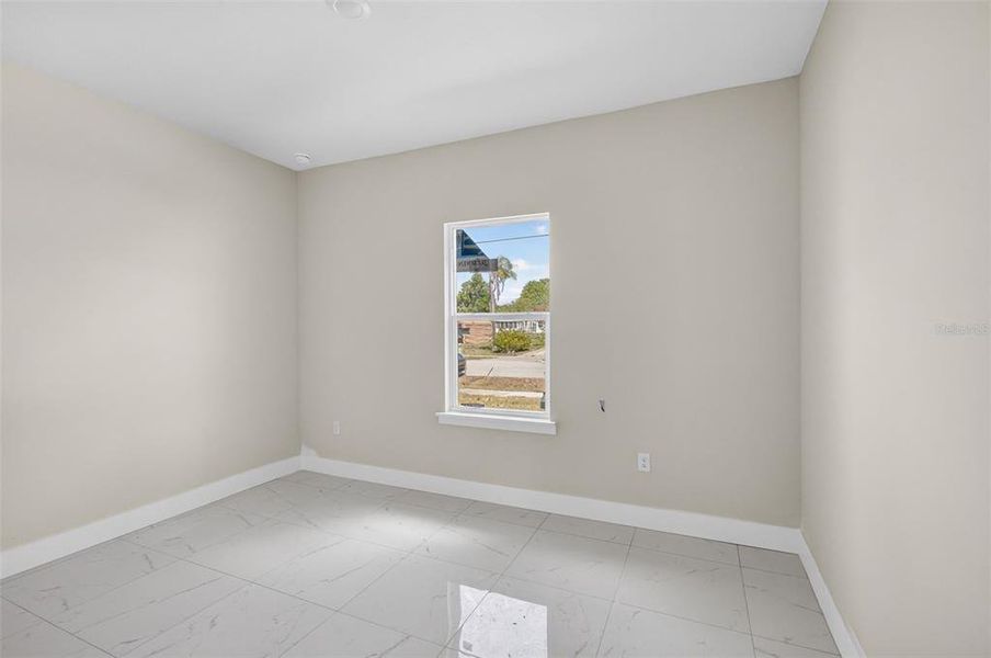 Spacious, unfurnished interior of a new home in , Port Charlotte (Image 28).