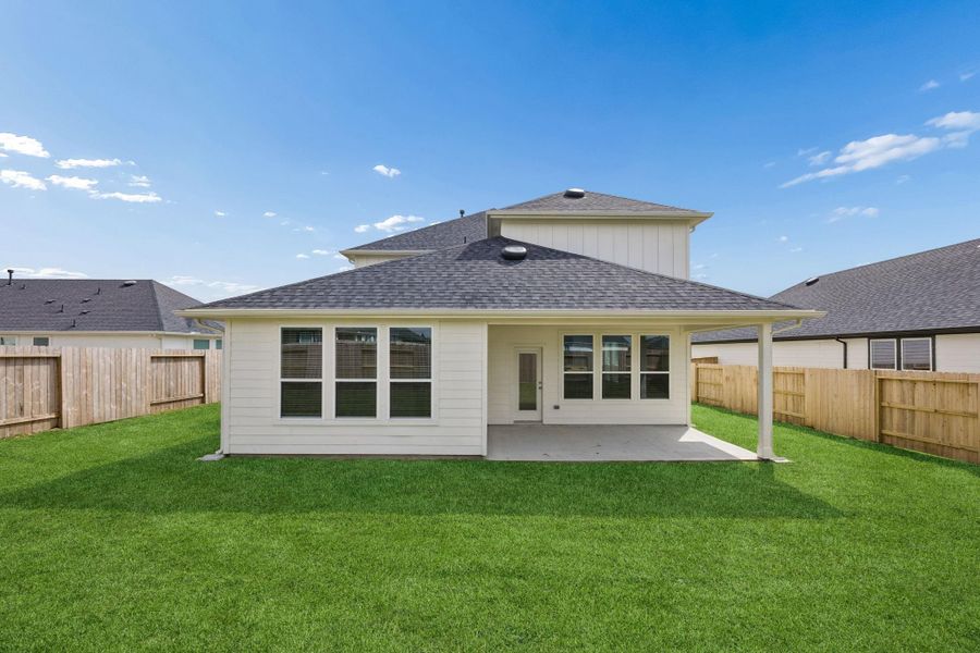 Exterior details and patio area of a home in Windcress, Cove (Image 3).