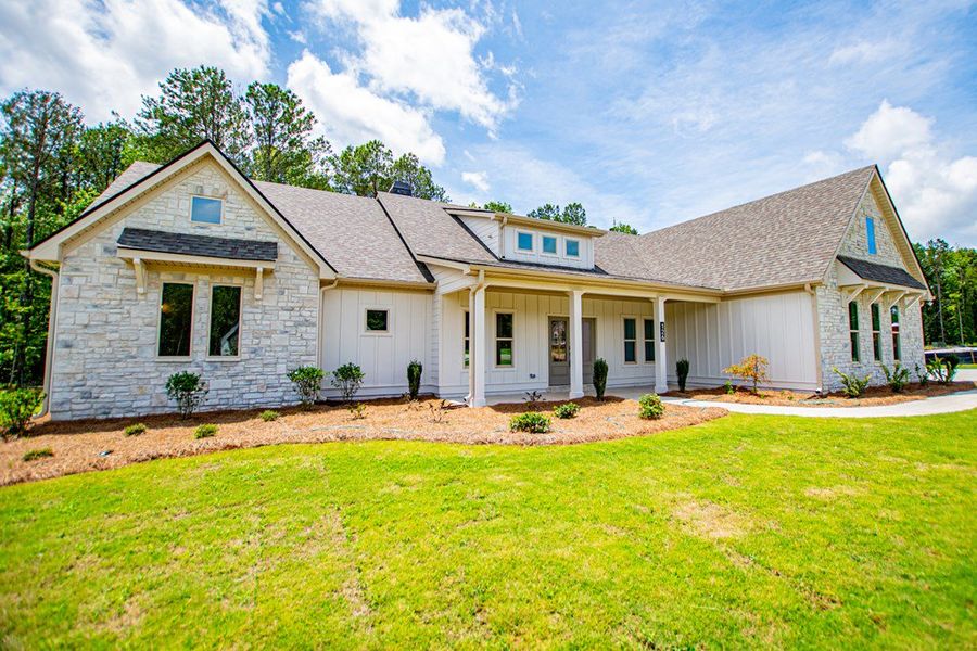 Exterior details and patio area of a home in WOODMONT RESERVE, Roopville (Image 38).