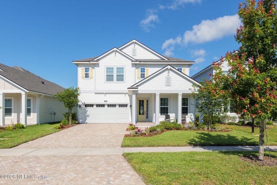 Front exterior of a new home in Seabrook Village at Seabrook, Ponte Vedra, FL, highlighting curb appeal (Image 31).