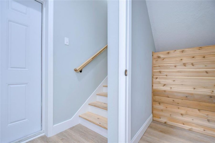 Back downstairs you'll love this cedar lined storage closet that's just off the garage and steps away form the kitchen. Who's doesn't love extra storage space?!