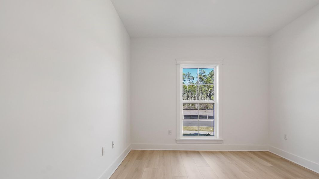 Representative unfurnished interior of a home built from the Camellia by D.R. Horton in Breakfast Point East Phase II, Panama City Beach (Image 24).