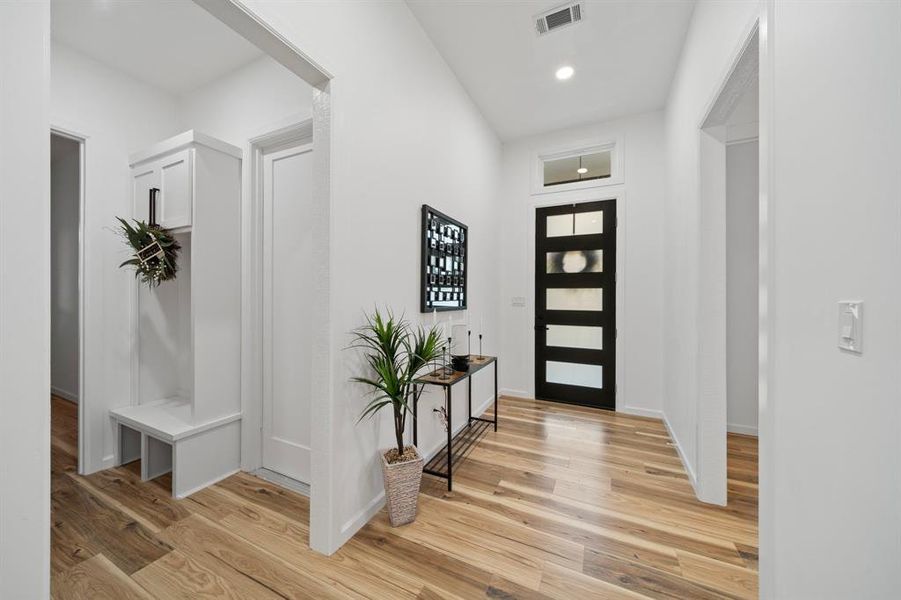 Corridor featuring light hardwood / wood-style flooring