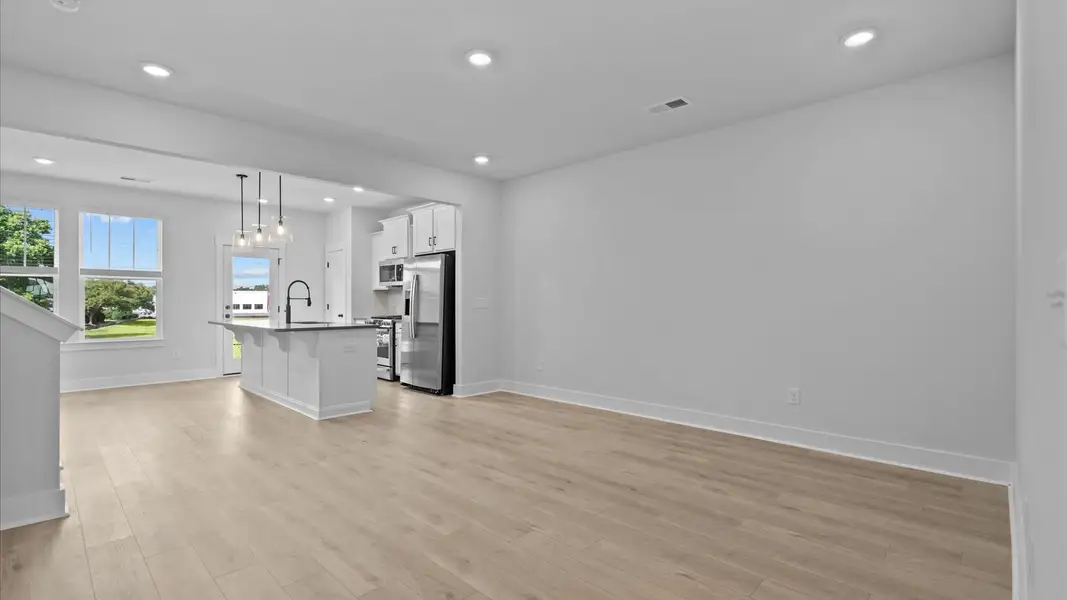 Accomplished layout centers around a spacious family room with exceptional flow and flexibility Accomplished layout centers around a spacious family room with exceptional flow and flexibility